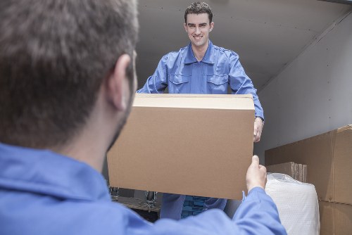 Professional house removalists packing boxes in Queensway