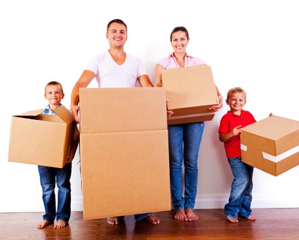 Removal team organizing belongings inside a new property
