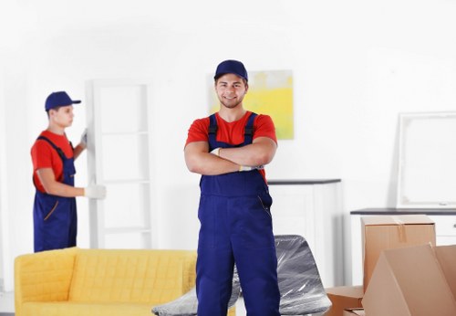 Team member supporting safe handling during a house move
