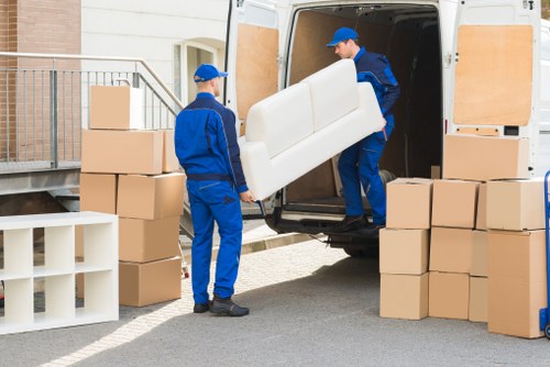 Man with a van loading furniture in Queensway