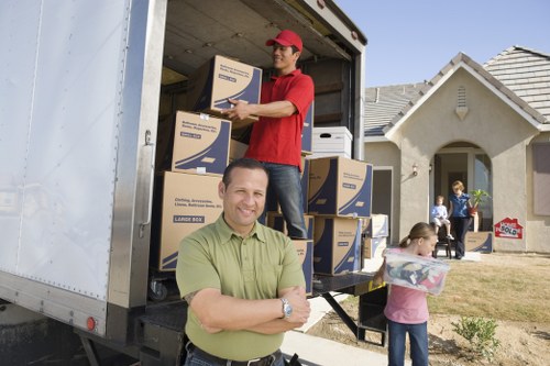 Furniture and boxes arranged for a cubic-yard removal estimate