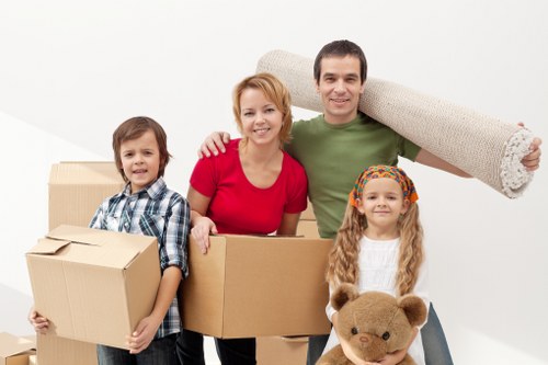 Organized self storage space in Queensway with boxes and furniture