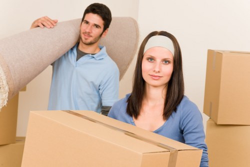 Movers using protective equipment during a relocation