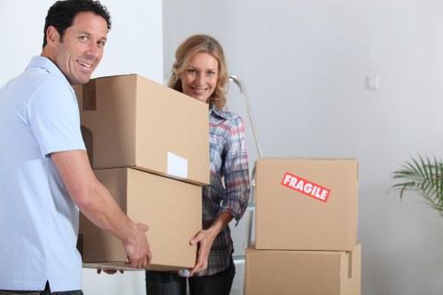 Packed boxes and furniture during a Queensway relocation
